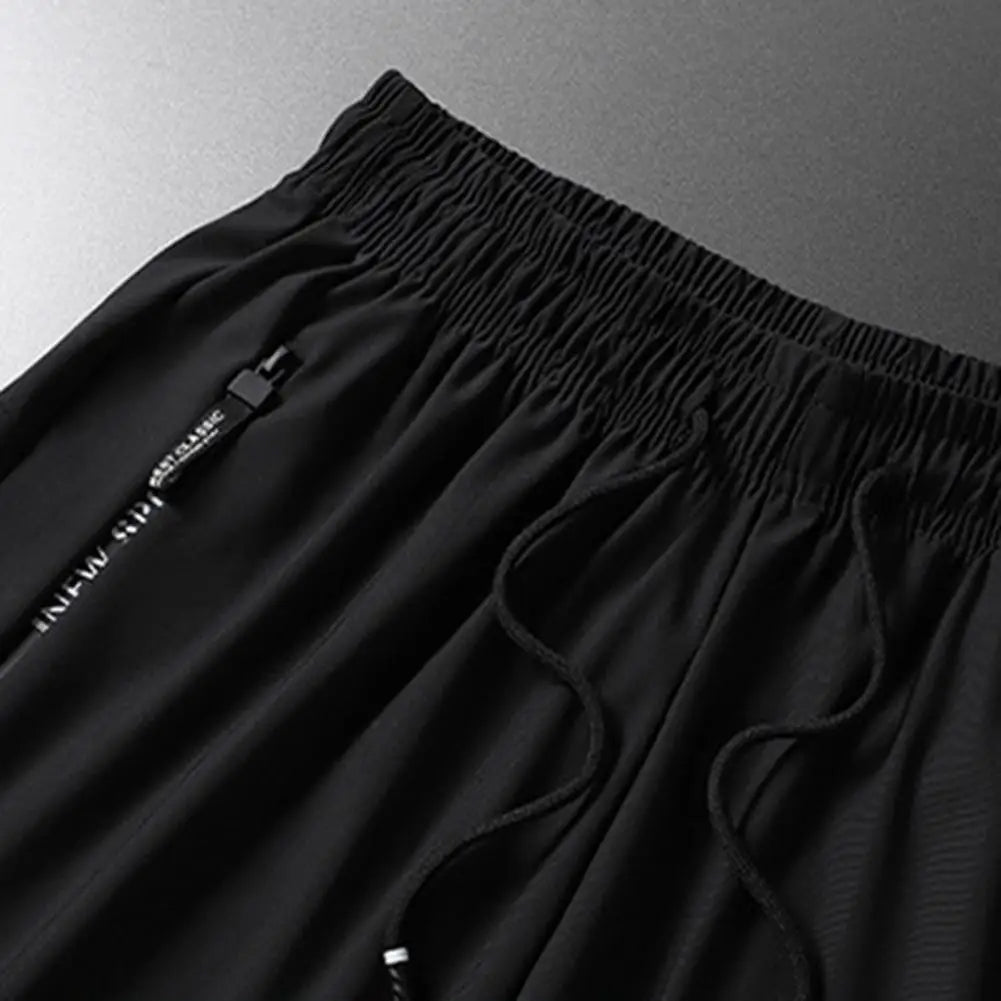 Men's Summer Ice Silk Pants Mesh Quick drying Ankle-banded Breathable Casual Thin Pants Loose Elastic Pants Sports Trousers