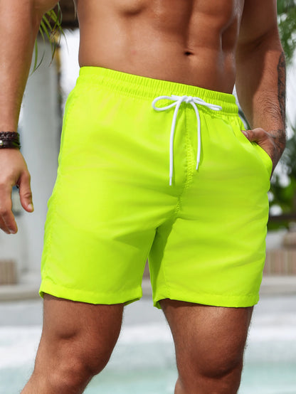 Summer holiday fluorescent coloured beach shorts shorts