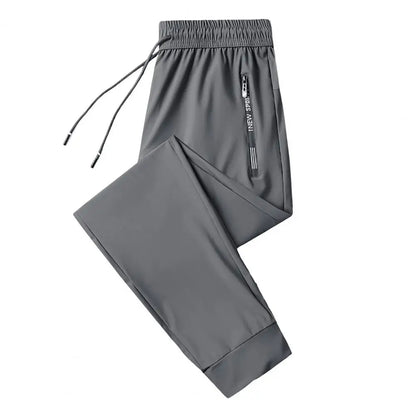 Men's Summer Ice Silk Pants Mesh Quick drying Ankle-banded Breathable Casual Thin Pants Loose Elastic Pants Sports Trousers