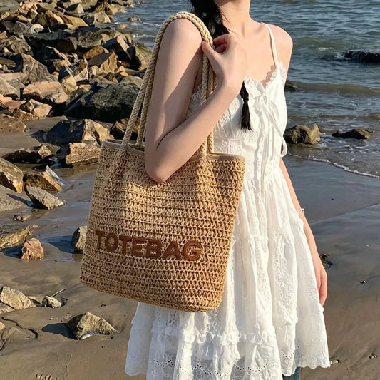French style large capacity woven straw woven bag for women, new beach vacation shoulder bag, casual commuting tote bag