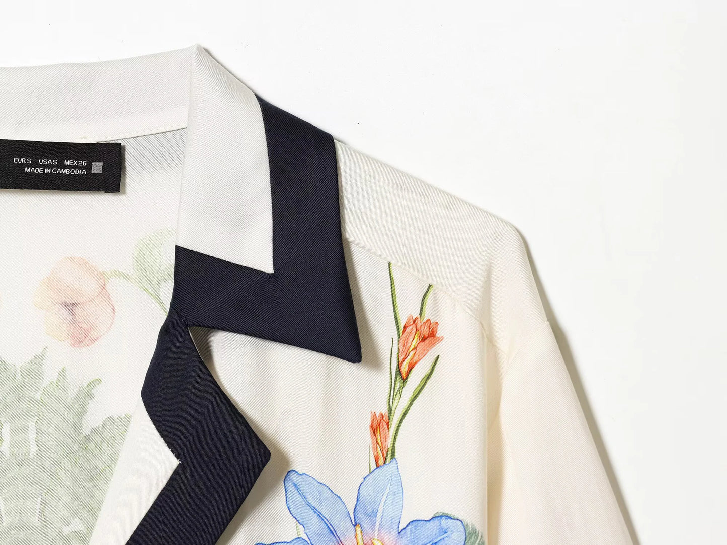 ZERAINS Casual style single row multi button lapel long sleeved contrasting printed shirt and printed pants set