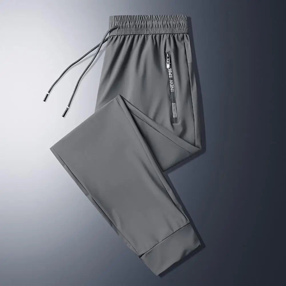 Men's Summer Ice Silk Pants Mesh Quick drying Ankle-banded Breathable Casual Thin Pants Loose Elastic Pants Sports Trousers