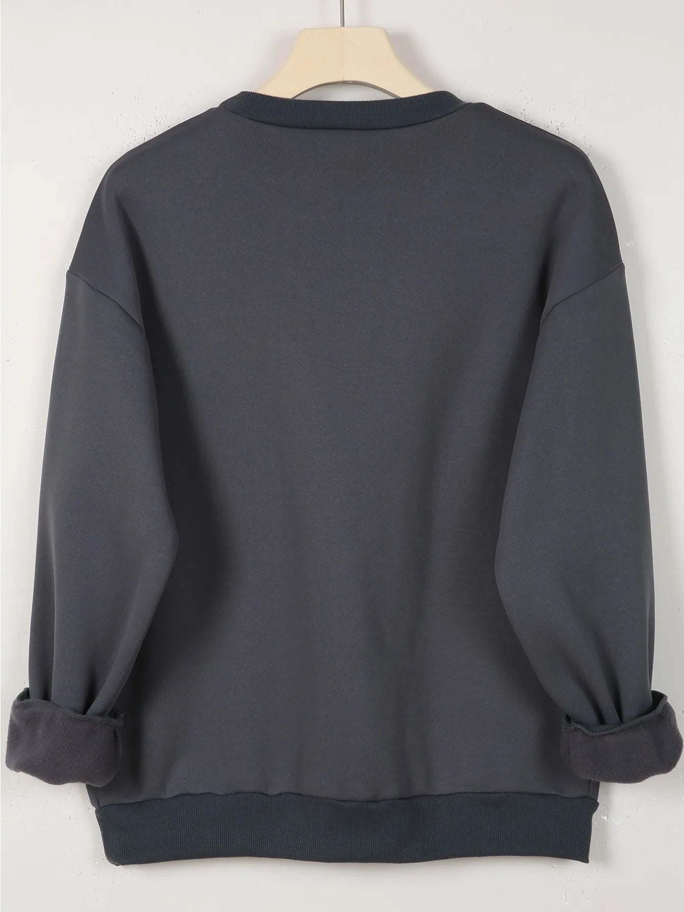 Women's autumn and winter casual fashion loose and comfortable warm eye pattern printed round neck long sleeved pullover